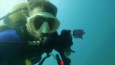 Bodrum’un ‘balık adam’ı değerli eşyasını denize düşürenler için dalıyor